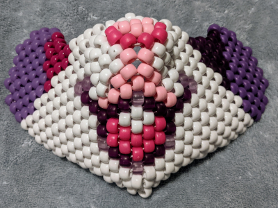 kandi mask of a smiling furry face