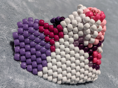 kandi mask of a smiling furry face